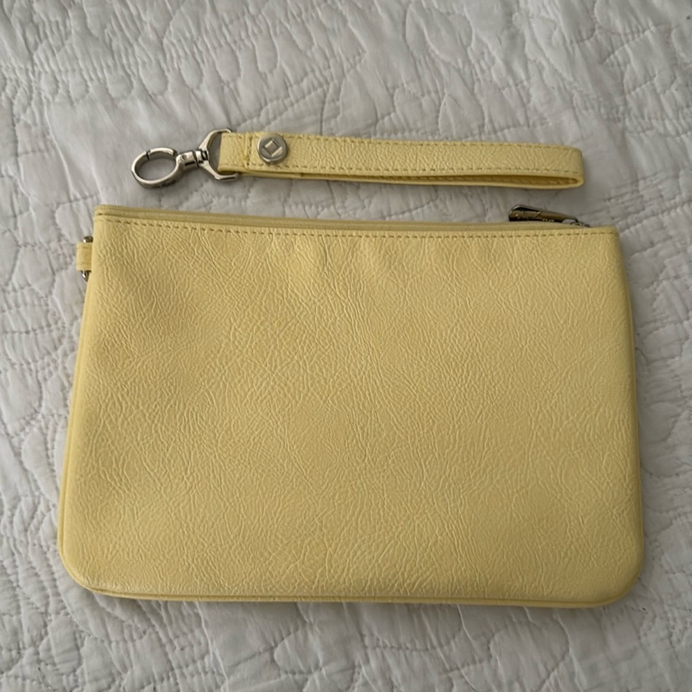 Brand New Thirty One Clutch with wrist strap.